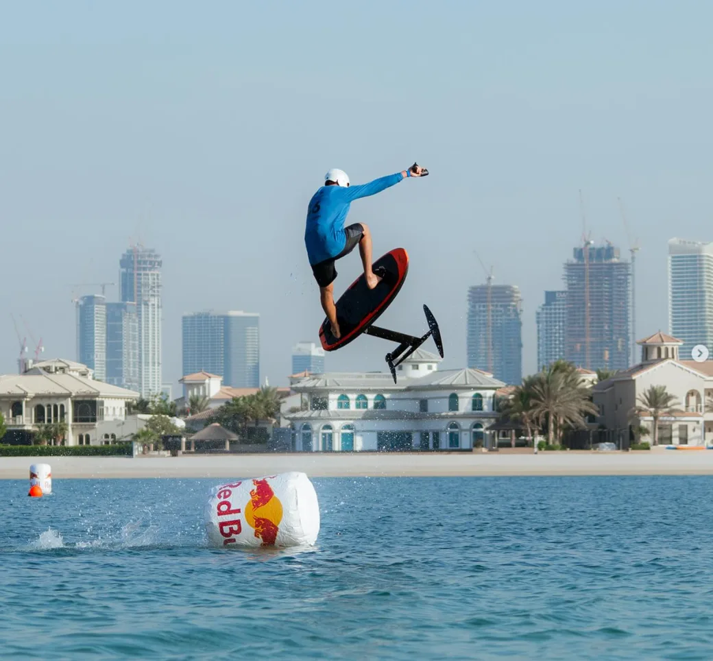 Manel Arpa jumping on a red-accent LIFTX efoil during an SFT race
